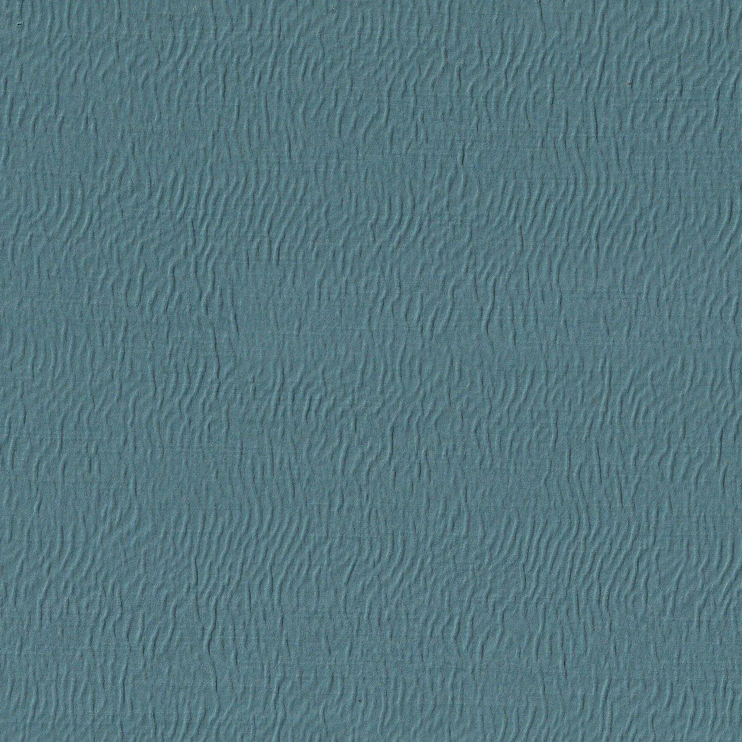 Woven blue curtain fabric with subtle pattern – Themes Furnishings