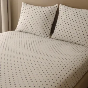 Woven beige bedsheet fabric with subtle pattern – Themes Furnishings