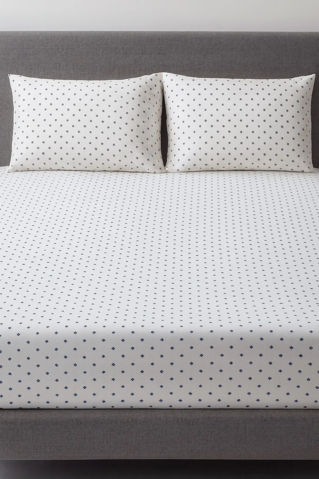 Soft white bedsheet fabric with subtle pattern – Themes Furnishings